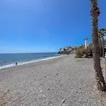 Bungalow playa Águila terraza piscina by Lightbooking