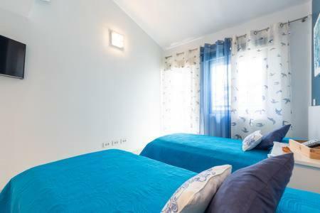 Lidia & Paco Two Bedrooms Beachfront Holiday home *